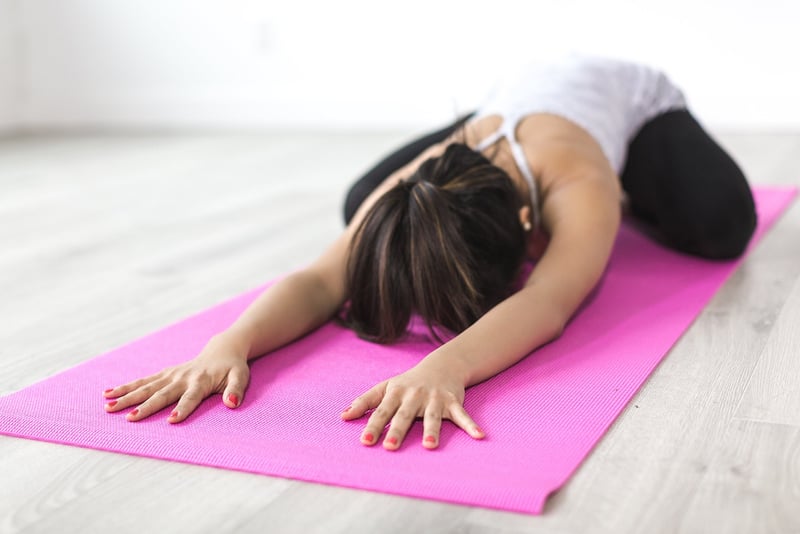 Woman practicing Hatha Yoga